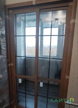 Ламинированная дверь на балкон